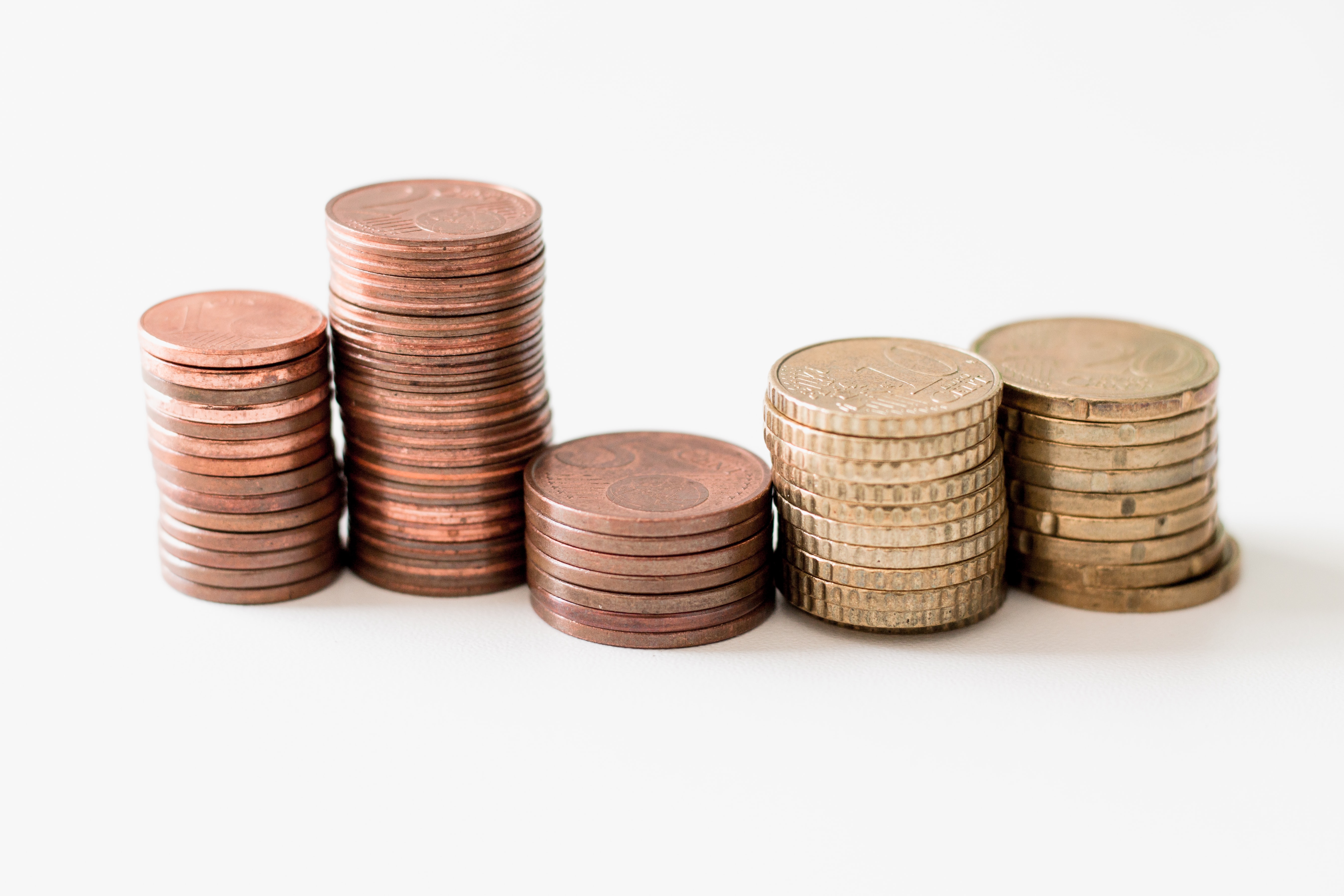 Photo by Ibrahim Rifath on Unsplash
Piles of coins as illustration to the text by Liz BlackX