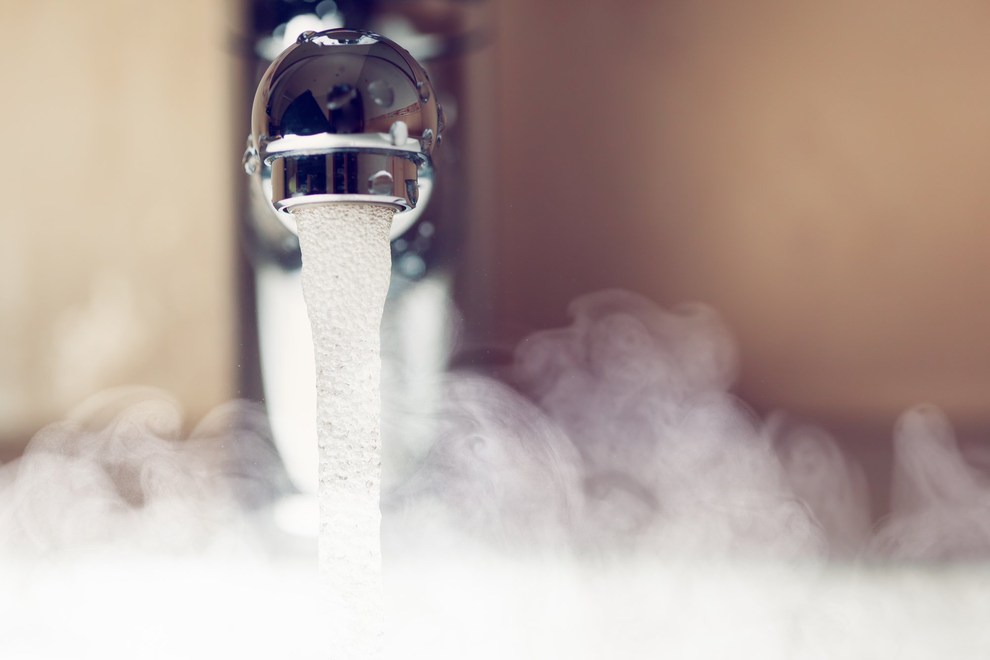 https://depositphotos.com/photo/water-tap-with-hot-water-steam-55457031.html